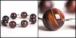 <span style='font-size: 12px;'>Red Tiger Eye and Silver Olive Bead Bracelet</span>