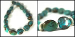 <span style='font-size: 12px;'>Silver and Turquoise Oval Bead Necklace</span>